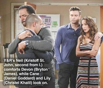 Neil is comforted by Devon.jpg